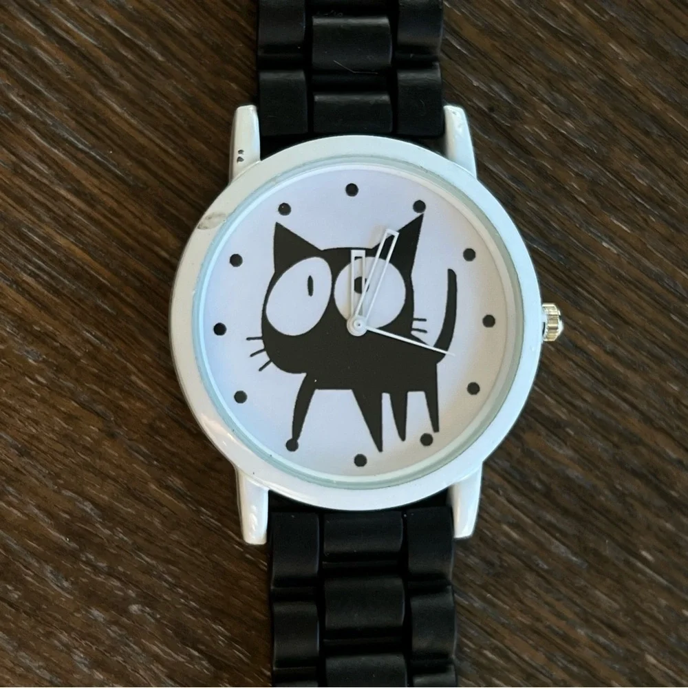 Cat watch, rubber black watch band. Gently used